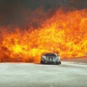RC car driving through flames