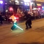 Street performers acting out Star Wars